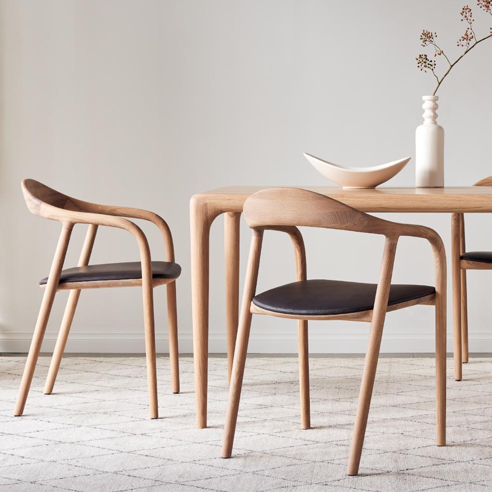 Artisan Neva Chairs & Latus Table shown in oak