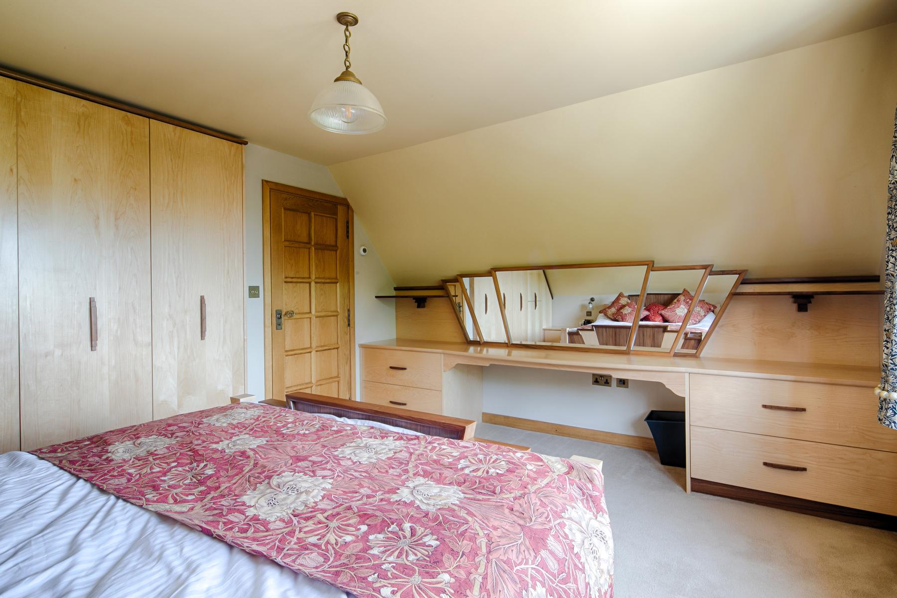 Walnut & maple fitted bedroom